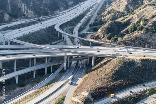 Aerial view of the 5 and 14 freeway interchange bridges in the Newhall Pass north of Los Angeles California.