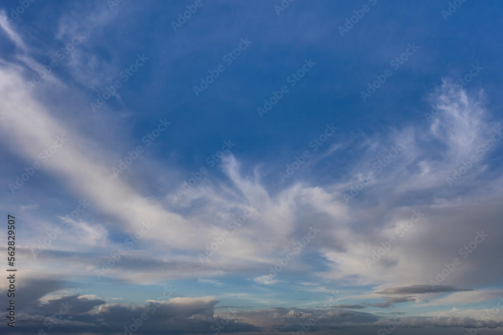 Blue sky with clouds background overlay. Ideal for sky replacement.	