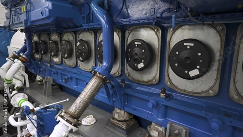 Main engine of vessel. Cylinder covers of diesel inside ship