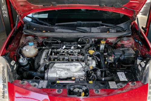 Car hood opened in a garage