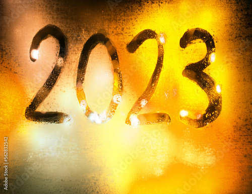 New year background of misted glass. 2023 numbers photo