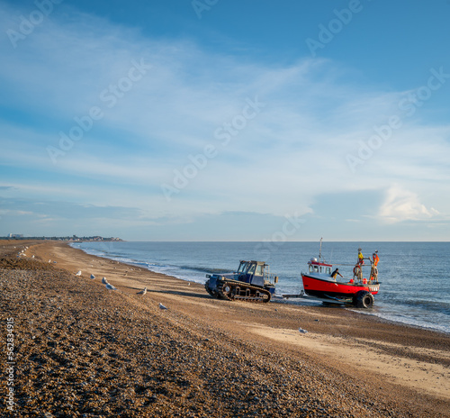 Foto Fishing boat coming ashore