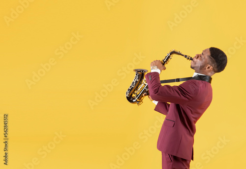 Black man playing saxophone