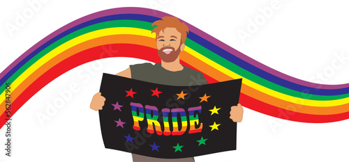 A bearded man with unconventional orientation
on the background of colored flag
holds a poster
with inscription PRIDE in his hands. 
I'm proud that I'm gay.
Lgbt symbol in the colors of the rainbow