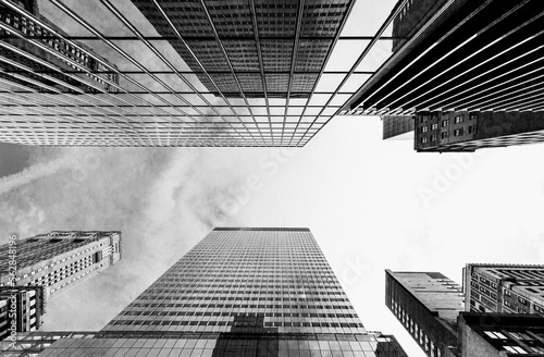 Looking Up Blue Modern Office Building Bottom view of business buildings skyscrapers in New York City Skyline