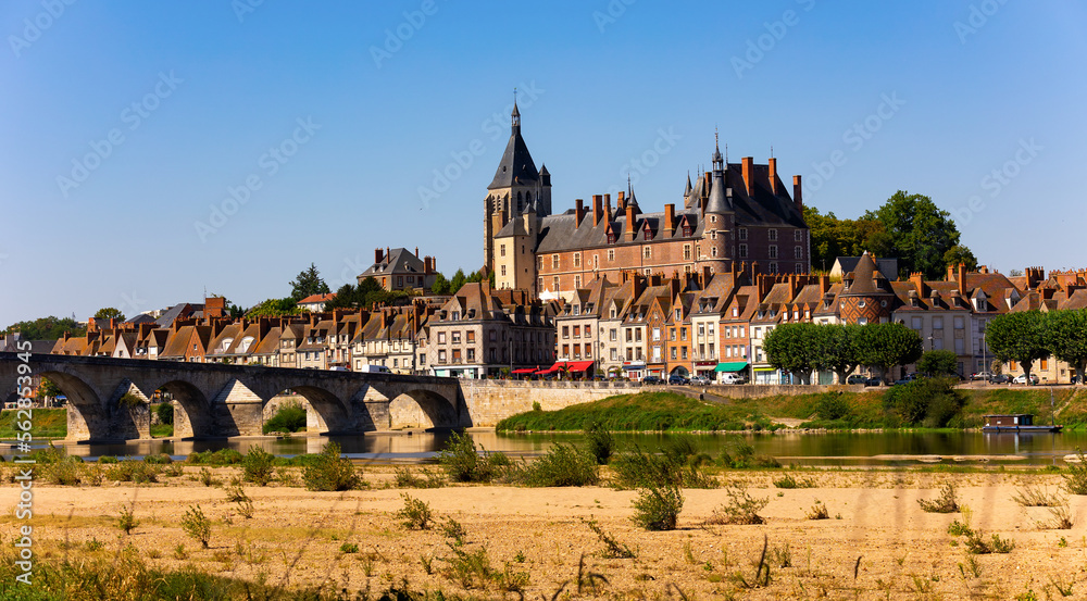 View of Gien with the castle and the old bridge across the Loire river, France