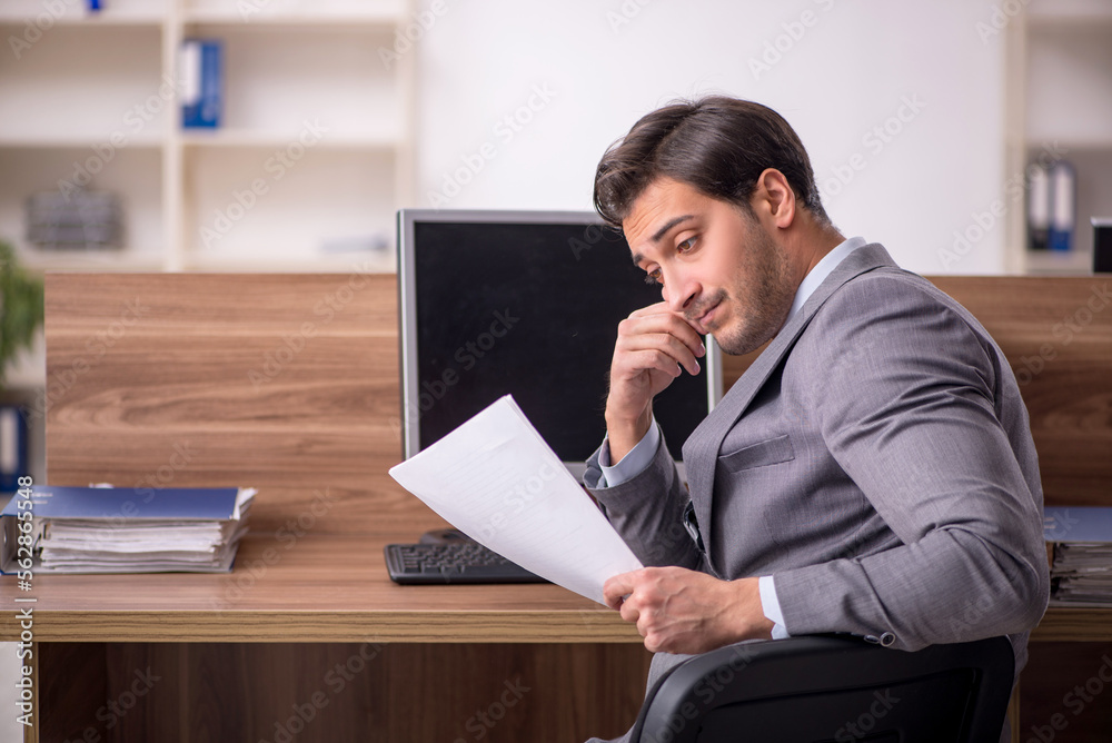 Two male colleagues working in the office Two male colleagues working in the office