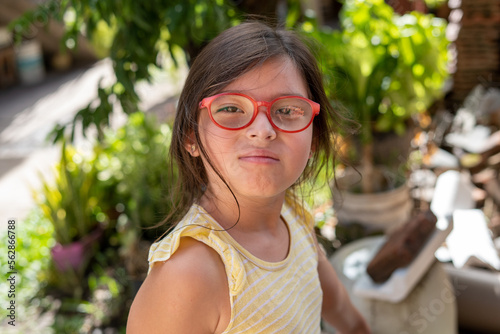 Girl looking mocking and overestimating photo