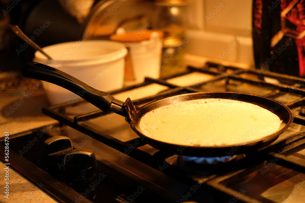 cooking pancake at home on the stove in a frying pan. Pancake week
cooking pancake at home on the stove in a frying pan. Pancake week