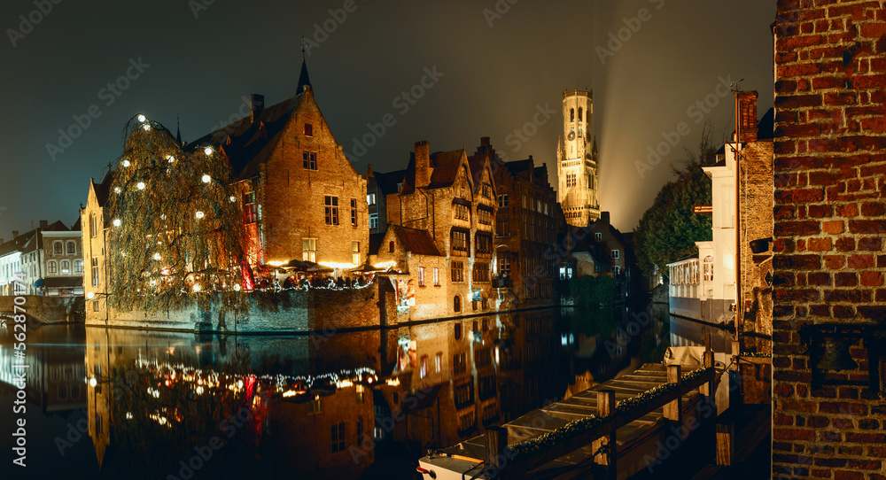 Iconic view of night Brugge in Belgium. Touristic poster.