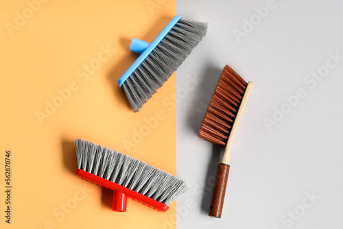 Different cleaning brushes on color background