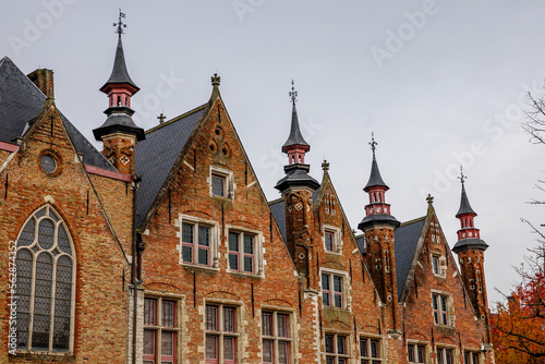 Gothic architecture. Palace spiers in Bruges, Belgium. © 9parusnikov
