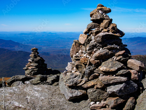 Cairns on Mount Washington, New Hampshire, with view over the landscape in sunshine. © Karlsson Photo