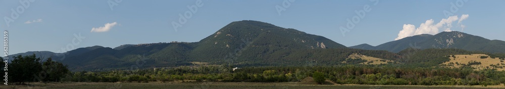 Fototapeta premium Panoramic terrain of southern Europe. Landscape of Bulgaria-mountains, fields, flora.