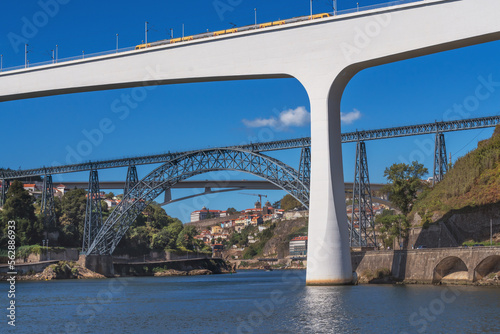 View of three bridges down the Douro River in Porto the Ponte de Sao Joao and Ponte Dona Maria Pia and Ponte Infante Dom Henrique photo