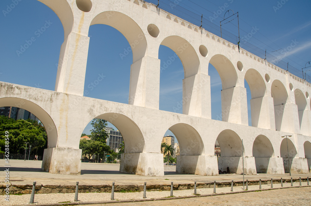 Landmark white arches of Arcos da Lapa under bright blue skies in Centro of Rio de Janeiro Brazil