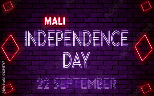 Happy Independence Day of Mali, 22 September. World National Days Neon Text Effect on bricks background