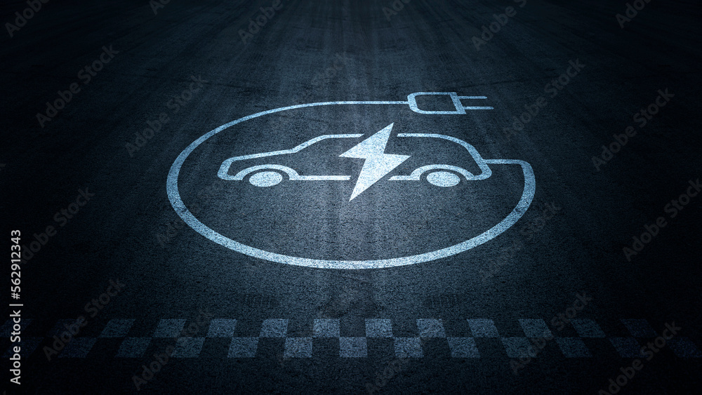 An Electric car parking bay, with an EV/Logo design on the floor