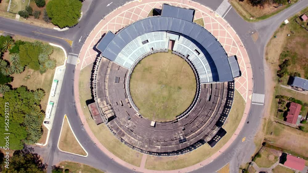 Top view rotating aerial view of the circle design of the Real de San Carlos bullring, sunny day, Colonia del Sacramento, Uruguay. Top view rotating aerial view of the circle design of the Real de San Carlos bullring, sunny day, Colonia del Sacramento, Uruguay.