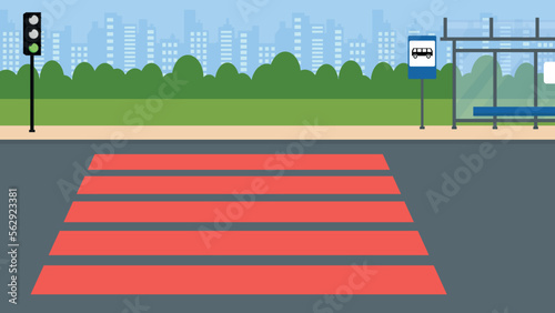 Pedestrian crossing at a traffic light near a bus stop