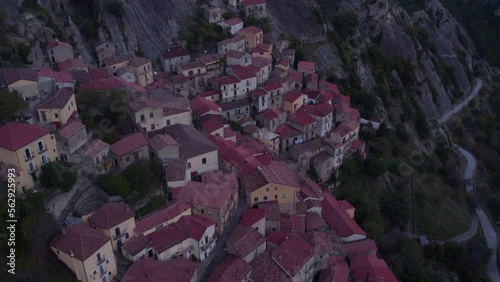 Idyllic residential houses on steep mountain village with narrow alleys, Castelmezzano photo