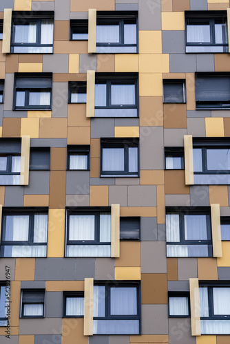 Vertical view of colorful geometric facade of modern architecture apartment building, Montpellier, France
