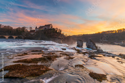 Rhine Falls or Rheinfall  Switzerland panoramic view. Tourist boat in waterfall. Bridge and border between the cantons Schaffhausen and Z  rich. The Largest waterfall in Europe.