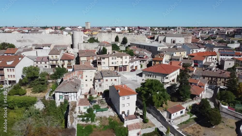 aerial view medieval wall between traditional houses trees blue sky and daylight aerial view medieval wall between traditional houses trees blue sky and daylight