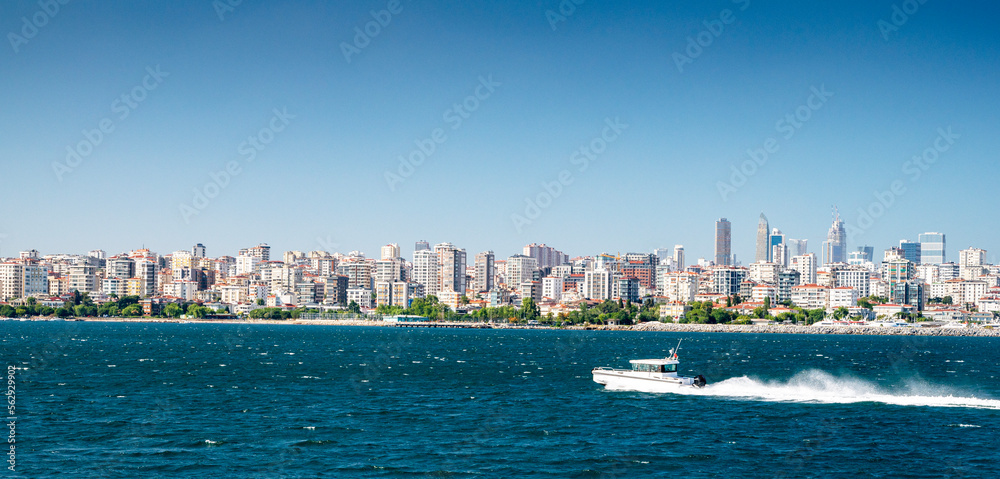 Panoramic view from the sea to Istanbul. The boat is sailing on the waves in the Sea of Marmara summer sunny day.