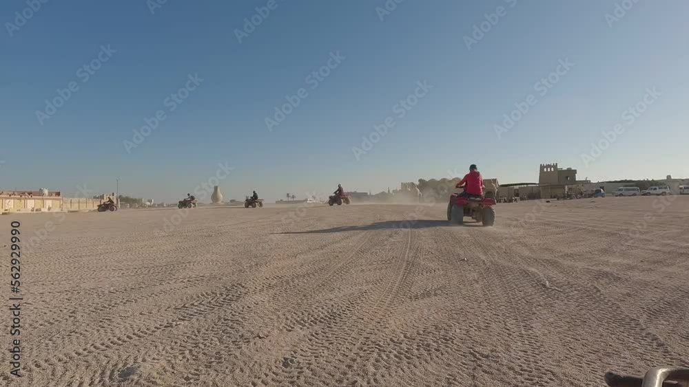 Safari Ride Buggies and Quad Bikes Through the Desert Hurgada, Egypt. Adventures of Desert Off-road on Atv.sand and Sand Borkhan. Rock and Sunset. Quad Cycle Travel. Excursion With People.