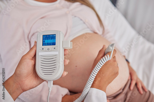 Bild auf Leinwand Pregnant, woman and doctor hands with heart monitor for baby healthcare, medical support or hospital gynecology
