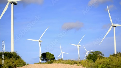 Windmills rotating in Spanish wind farm drone shot, aerial view of wind mill in Spain.