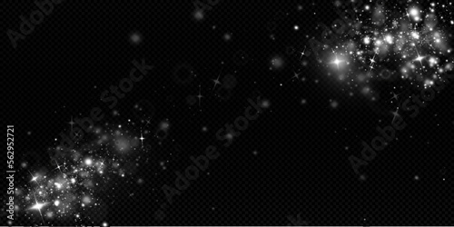 Light effect with glitter particles.Christmas dust.White sparks shine with special light.