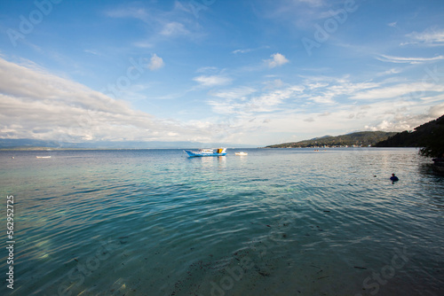 Beautiful view of Tanjung Karang Beach, a tropical beach in Donggala, Central Sulawesi, Indonesia. Popular tourist destination in Donggala.  photo