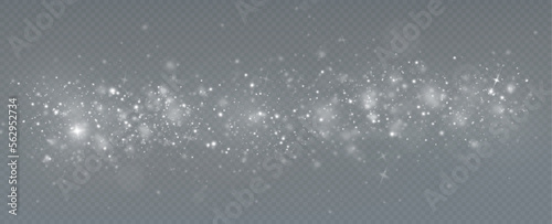 Light effect with glitter particles.Christmas dust.White sparks shine with special light.