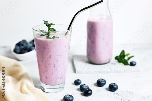 Homemade blueberry smoothie with fresh blueberries. Diets and detox. Healthy refreshing drink, vegan and vegetarian diet food concept
