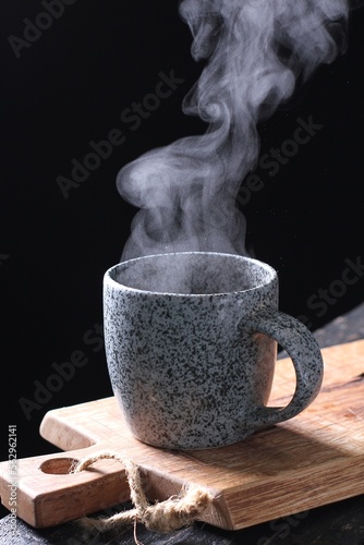Tea is an aromatic beverage prepared by pouring hot or boiling water over cured or fresh leaves of Camellia sinensis, an evergreen shrub native to East Asia which probably originated in the borderland