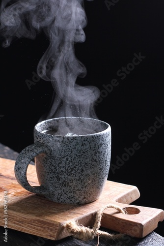 Tea is an aromatic beverage prepared by pouring hot or boiling water over cured or fresh leaves of Camellia sinensis, an evergreen shrub native to East Asia which probably originated in the borderland