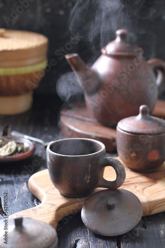 Obraz na plátně Tea is an aromatic beverage prepared by pouring hot or boiling water over cured