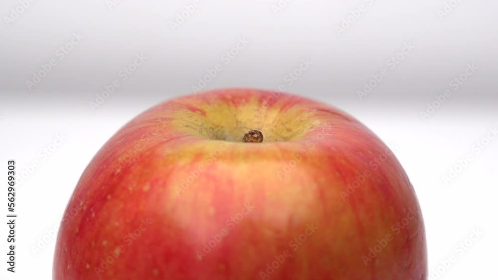Apple Spinning Close Up On White Backdrop 4k Apple Spinning Close Up On White Backdrop 4k