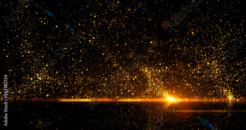 Sparkling glittering on black. Gold particles motion on black Flying particles