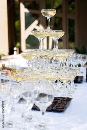 Glasses of champagne on the festive table. serving for the wedding ceremony