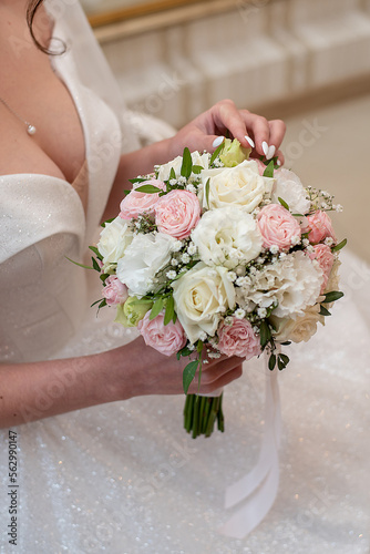 delicate wedding bouquet in the hands of the bride. idea for event agencies