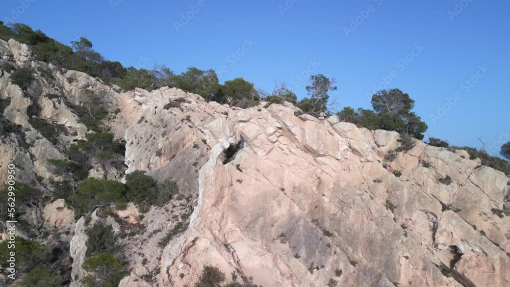 Group of hikers. Perfect aerial view flight panorama orbit drone
edge cliff hike on island ibiza, autumn 2022. High Quality 4k Cinematic footage Group of hikers. Perfect aerial view flight panorama orbit drone
edge cliff hike on island ibiza, autumn 2022. High Quality 4k Cinematic footage