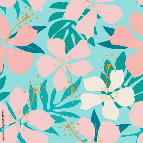 Floral seamless pattern. Modern exotic design for textiles. Tropical green leaves and delicate pink hibiscus flowers on a turquoise background. Vector.