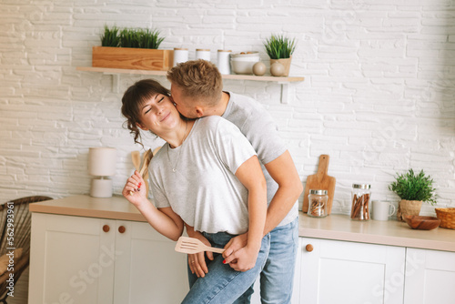 Loving young couple spending time together at home.