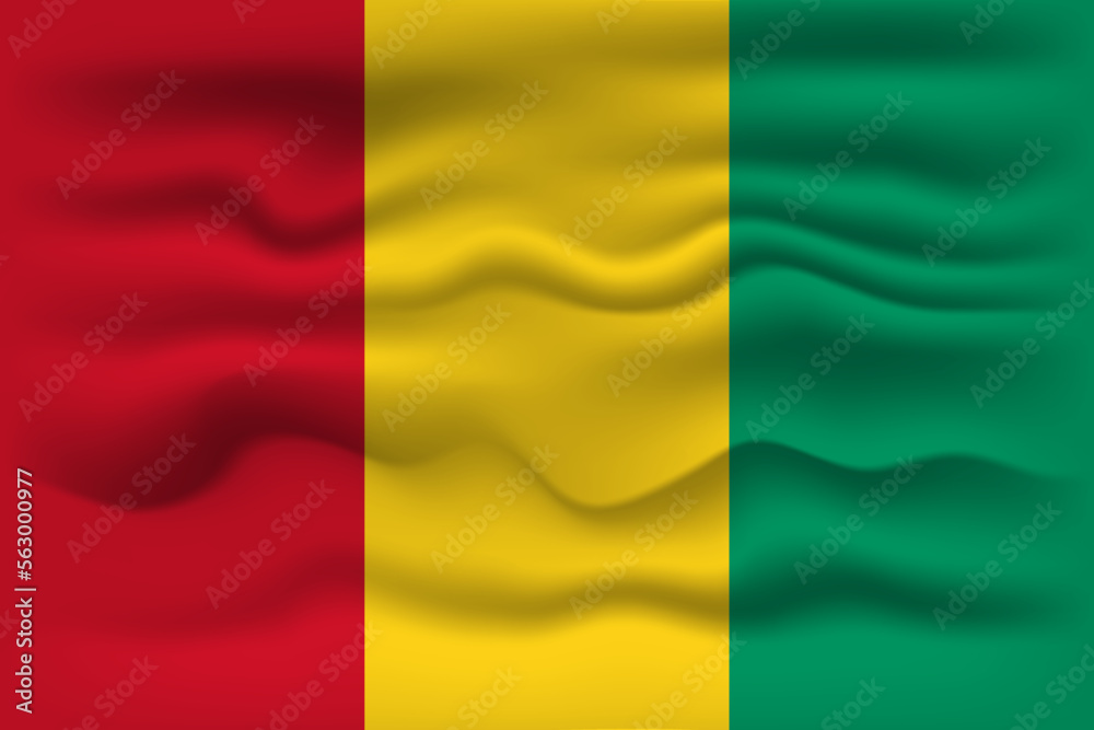 Waving flag of the country Guinea. Vector illustration.