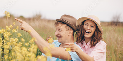 happy couple in the field. Couple hands. Man and woman. Background. Smiling. Smile. 