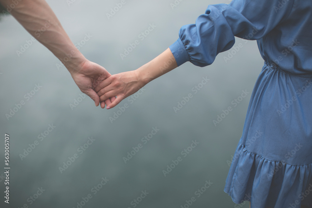 man and person shaking hands. Couple in love. Love concept. Gesture. Help. man and person shaking hands. Couple in love. Love concept. Gesture. Help.