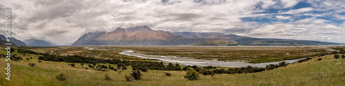 Panoramic view of the Tasman River valley near Mount Cook in the South Island of New Zealand with mountains in the distance